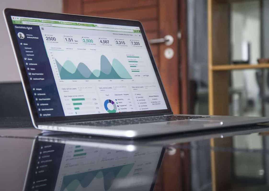laptop showing graph and data