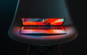 Open laptop with red background showing best blogging resources