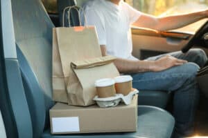 Uber Eats vs. Doordash, Man delivering food