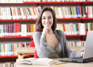 Woman smiling while working