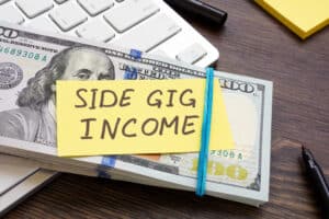 Best Fiverr Gigs, stack of money noted side gig income