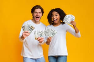 How To Flip Money, happy couple holding cash