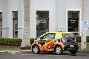 Car Wrap Advertising Stock photo Burgerfi Delivery vehicle with wrapped advertising