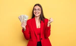 How To Make $5000 Fast woman holding money