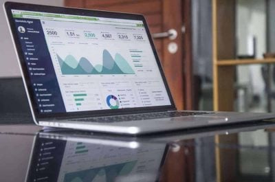 laptop showing graph and data